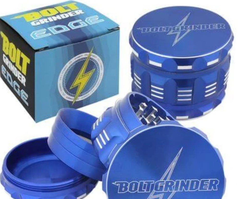 Blue metal herb grinder with lightning design and packaging box.