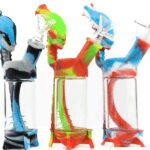 Colorful high-heeled shoes with clear heels in vibrant abstract designs.