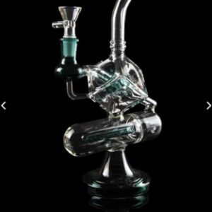 A sleek glass water pipe with intricate design and green accents.