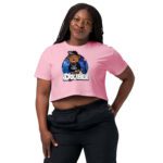 Woman wearing a pink crop top with a cartoon graphic and black pants.