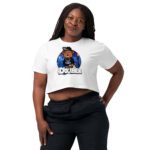 Woman wearing a white crop top with a colorful graphic design.